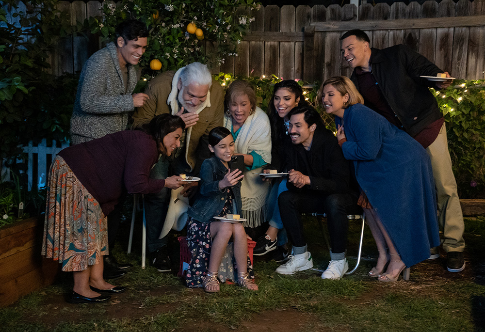 From left: Manuel Uriza as Ernesto, Laura Patalano as Beatriz, Joaquín Cosío as Casimiro, Bianca Melgar as Nayeli, Alma Martinez as Lupe, Karrie Martin as Ana, Carlos Santos as Chris, Annie Gonzalez as Lidia, and JJ Soria as Erik in "Gentefied." (Netflix)