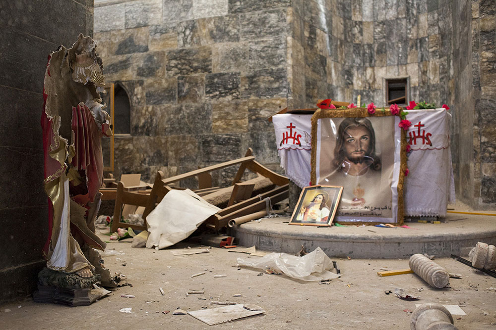 The inside of Al-Tahera Cathedral in Mosul, Iraq, in November 2016, a few days after Qaraqosh was liberated from Islamic State control (NCR photo/Eugenio Grosso)