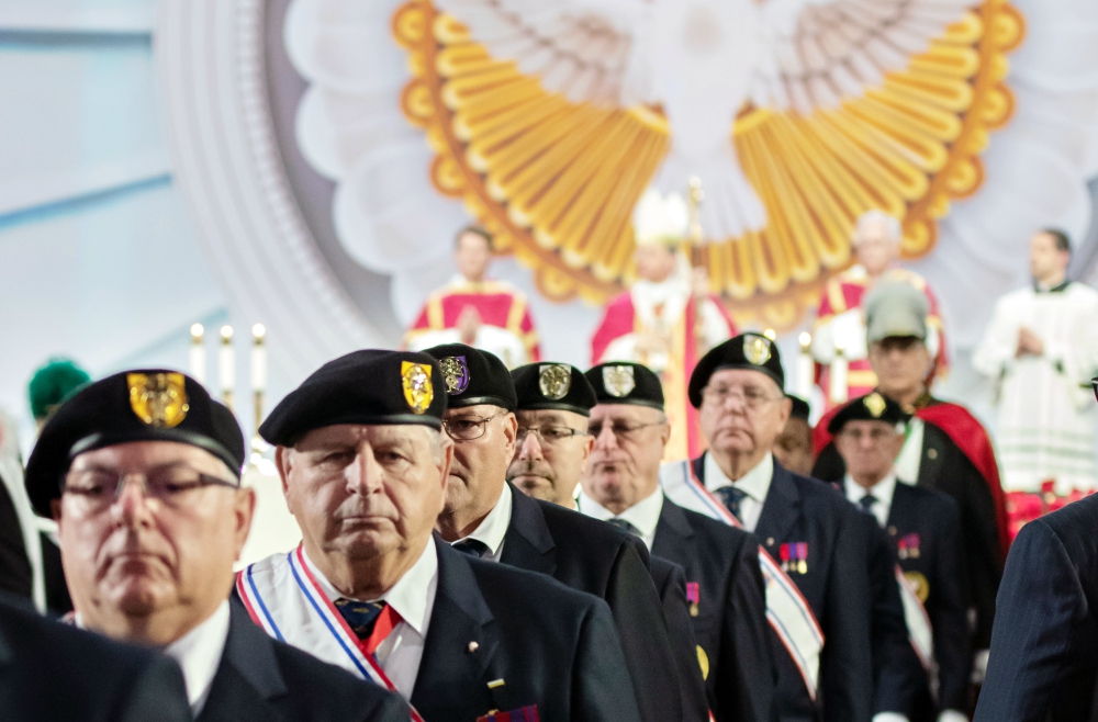 Members of the Knights of Columbus are seen during the closing procession of the 136th Supreme Convention's opening Mass Aug. 7, 2018, at the Baltimore Convention Center. (CNS/Catholic Review/Kevin J. Parks)