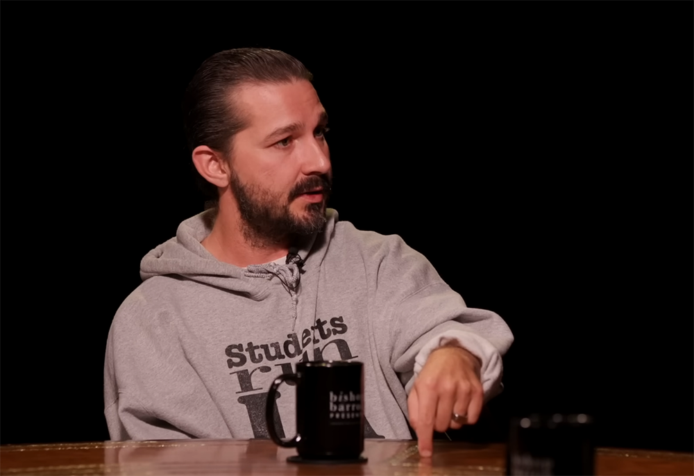 Actor Shia LaBeouf gestures during an interview with Bishop Robert Barron. (YouTube screenshot/Bishop Robert Barron)