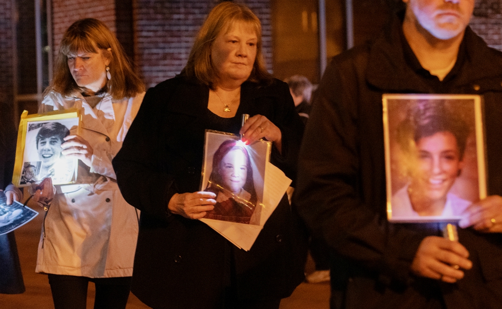 Supporters of Survivors Network of those Abused by Priests walk in memory of abuse victims outside the Nov. 12 assembly of the U.S. Conference of Catholic Bishops in Baltimore. (CNS/Catholic Review/Kevin J. Parks)