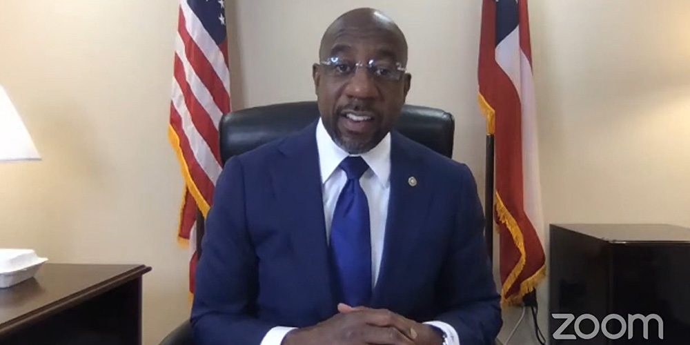 Sen. Raphael Warnock of Georgia speaks during an April 28 webinar hosted by Interfaith Power & Light. (NCR screenshot) 