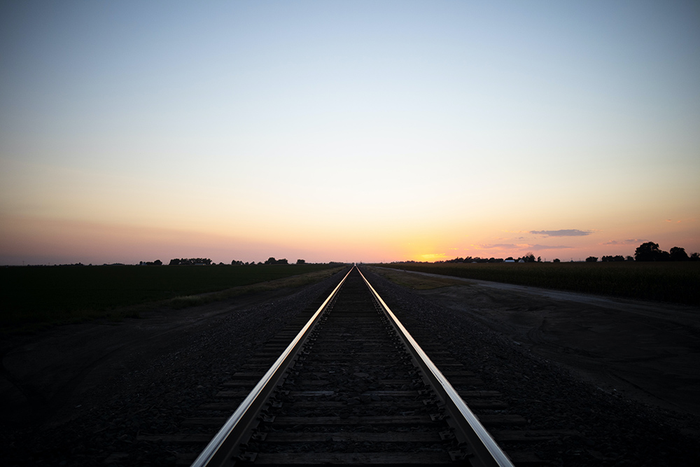 A rail line in Brush, Colorado (Unsplash/Mars Plex)