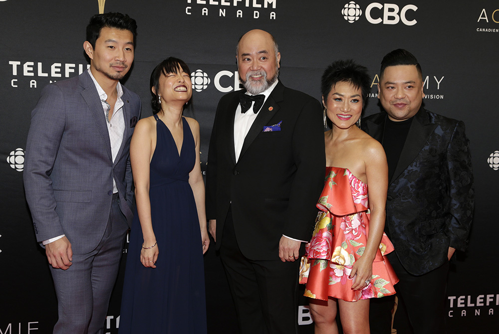 From left: Simu Liu ("Jung"), Andrea Bang ("Janet"), Paul Sun-Hyung Lee ("Appa"), Jean Yoon ("Umma"), and Andrew Phung ("Kimchee"), the cast of "Kim's Convenience," arrive on the red carpet at the 7th annual Canadian Screen Awards March 31, 2019, in Toron