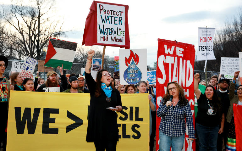 Eryn Wise from Jicarilla Apache Reservation in Minneapolis and Linda Black Elk from Standing Rock, N.D., join other activists protesting the Dakota Access Pipeline on Feb. 8 in Washington, D.C. (Rick Reinhard)