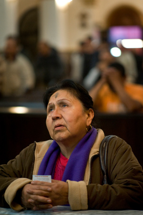 A woman prays during an Ash Wednesday service at Our Lady of Guadalupe Cathedral in Tijuana, Mexico, Feb. 13, 2013. (CNS/David Maung) 