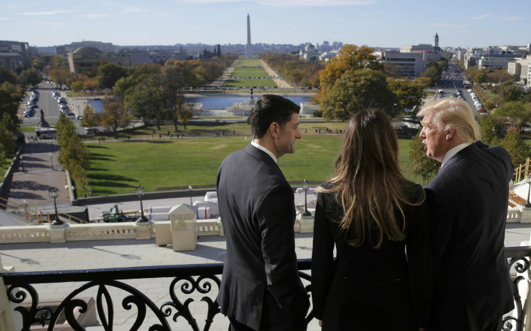 U.S. House Speaker Paul Ryan, R-Wis., shows Melania Trump and U.S. President-elect Donald Trump the Mall from his balcony on Capitol Hill in Washington Nov. 10. (CNS photo/Joshua Roberts, Reuters)