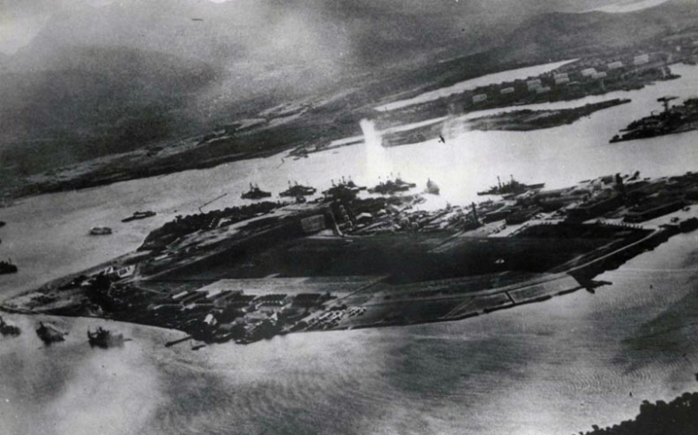 The first bomb is seen exploding during the Japanese attack on Pearl Harbor Dec. 7, 1941. (CNS photo/Pearl Harbor Museum)