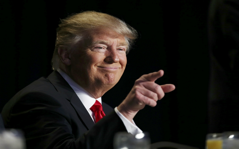 U.S. President Donald Trump gestures during the National Prayer Breakfast Feb. 2 in Washington. (CNS photo/Carlos Barria, Reuters)