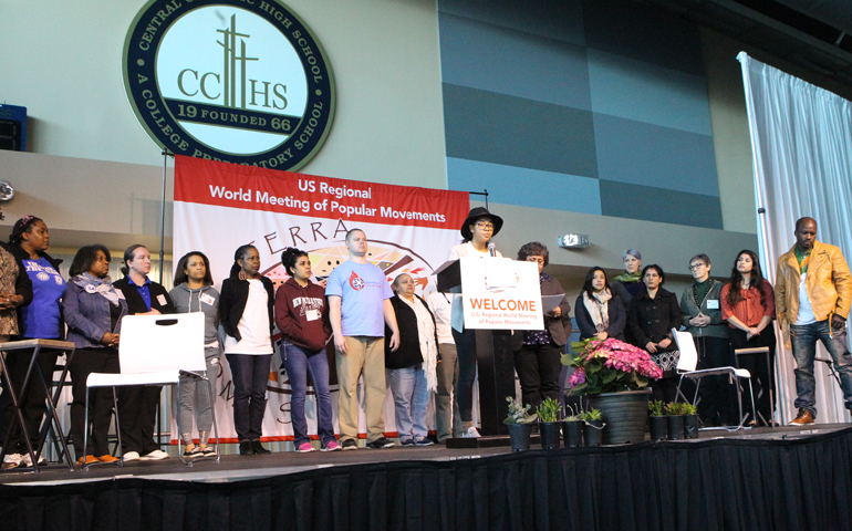 Representatives from small groups give the final message from the U.S. Regional World Meeting of Popular Movements Feb. 19 in Modesto, Calif. (CNS/Dennis Sadowski)