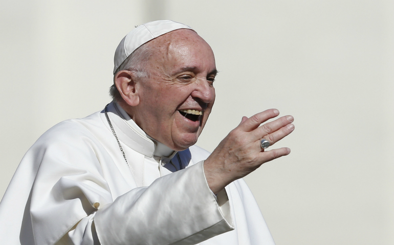 Pope Francis greets the crowd during his general audience in St. Peter's Square at the Vatican March 1. (CNS photo/Paul Haring)