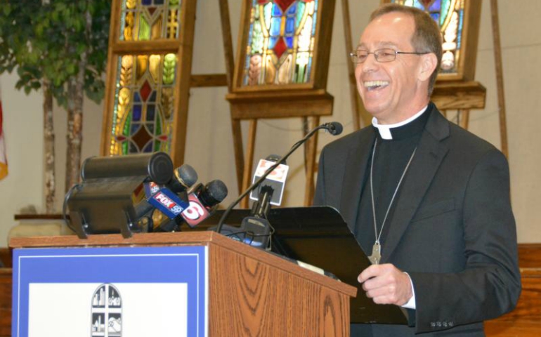 Bishop Charles Thompson of Evansville, Indiana, smiles during a June 13 news conference after Pope Francis named him the new archbishop of Indianapolis. (CNS/Natalie Hoefer, The Criterion)