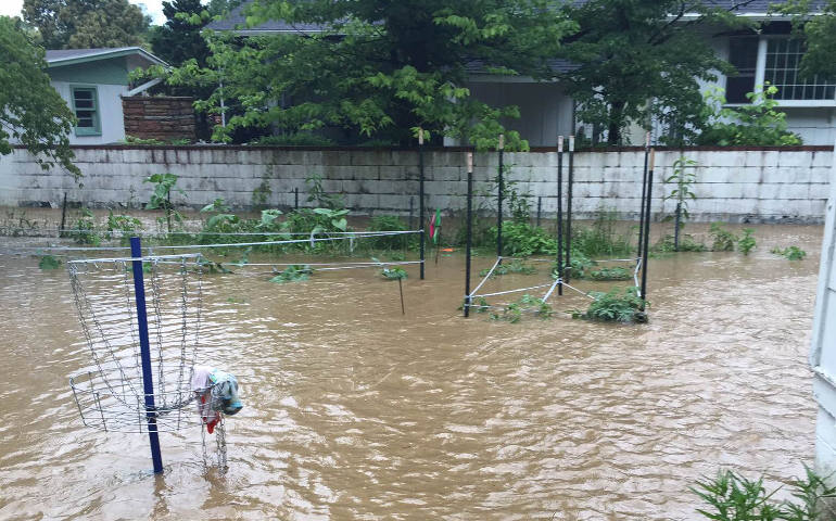 A view of the backyard of the home of Brian and Kathleen DeRouen after late-June flooding in Alderson, W. Va. The home was not salvageable. (The DeRouen family)