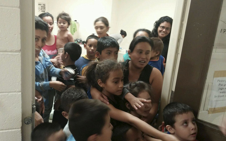 Unaccompanied migrant children at a Department of Health and Human Services facility in south Texas (CNS/Reuters/Handout)