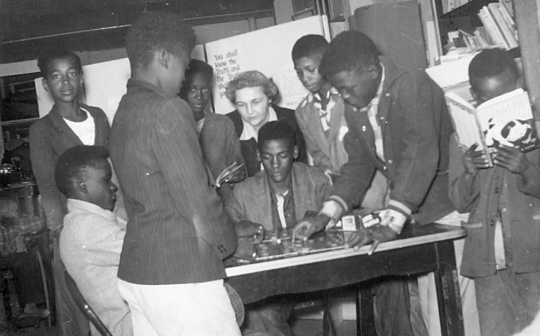 Members of Pax Christi and young men are pictured in this 1952 photo inside the St. Francis Information Center in Greenwood, Miss. The Catholic organization was a key player in the civil rights movement. (CNS/Courtesy diocese of Jackson archives/Bishop Oliver Gerow)