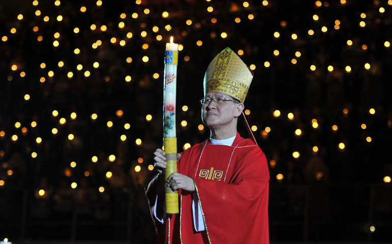 Cardinal Luis Antonio Tagle of Manila sent off more than 5,000 participants of the Philippine Conference on New Evangelization with a candle-lighting ritual and an appeal to "spread the light" of the Gospel. (Roy Lagarde)