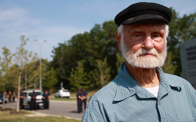 Jesuit Fr. Bill Bichsel protests at the National Nuclear Security Administration's Kansas City Plant in July 2013. (NCR photo/Kate Simmons)