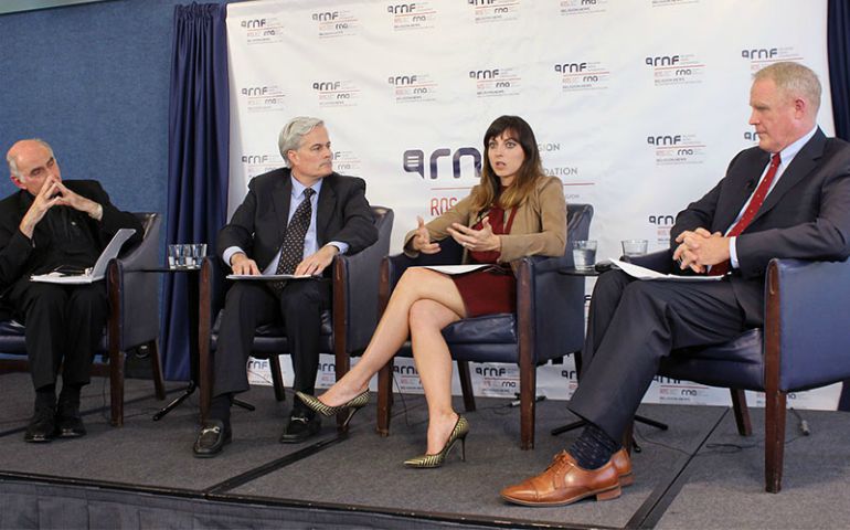 Simone Petrella, chief cyberstrategy officer of CyberVista, speaks during a panel discussion on “Cyber Attacks and Just War Theory” at the National Press Club on May 22. From left: Fr. Bryan Hehir, moderator Tom Gallagher, Petrella and retired U.S. Marine Corps. Brig. Gen. David G. Reis (Religion News Service/Adelle M. Banks)