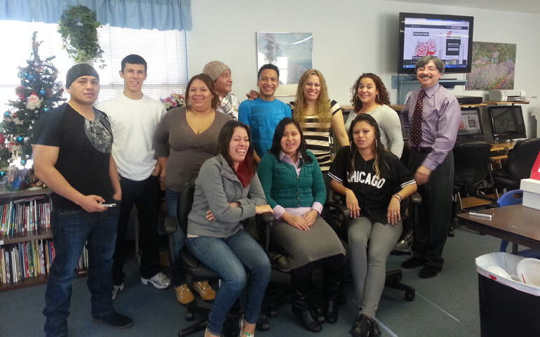 Raul Andrade, right, with students at the Dorothy Bennett Mercy Center