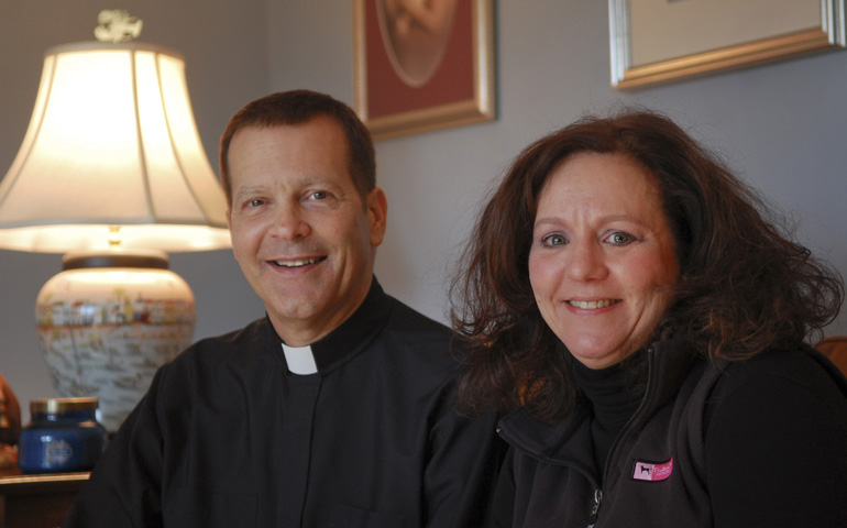 Fr. Michael Whyte, pastor of St. Catherine of Siena Parish in West Simsbury, Conn., and parishioner Margaret Domashinski (CNS/The Catholic Transcript/Jack Sheedy)