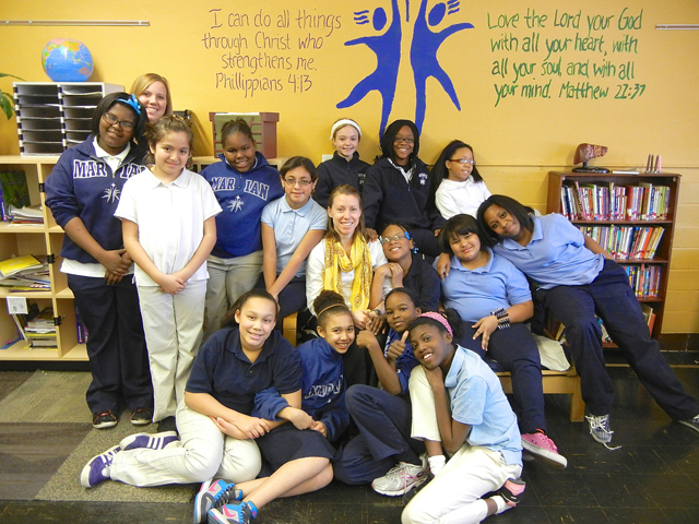 Sr. Sarah Heger, a Sister of St. Joseph of Carondelet, is pictured with her fifth-grade class in an undated photo in St. Louis. She joined other young religious sisters in San Francisco in early July for a national gathering convened by Giving Voice, a group created by sisters in their 20s, 30s and 40s. (CNS/courtesy Sr. Sarah Heger) 