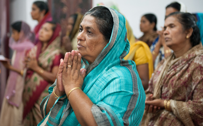 People pray at the St. Mary’s Syro-Malabar Catholic Forane Church in Alappuzha, India, Oct. 19, 2015. (Newscom/picture alliance/dpa-Zentralbi/Sebastian Kahnert)