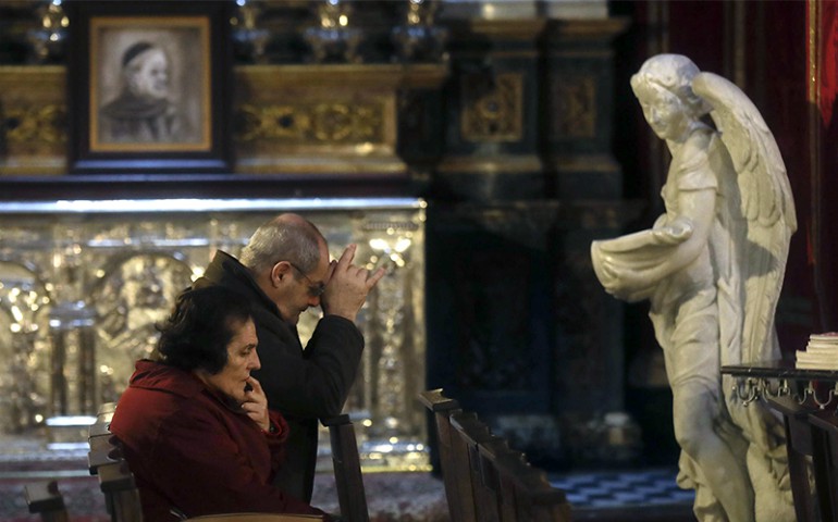 Faithful pray in St. John Cathedral in downtown Valletta, Malta, on Feb. 2, 2017. (Gregorio Borgia/AP)