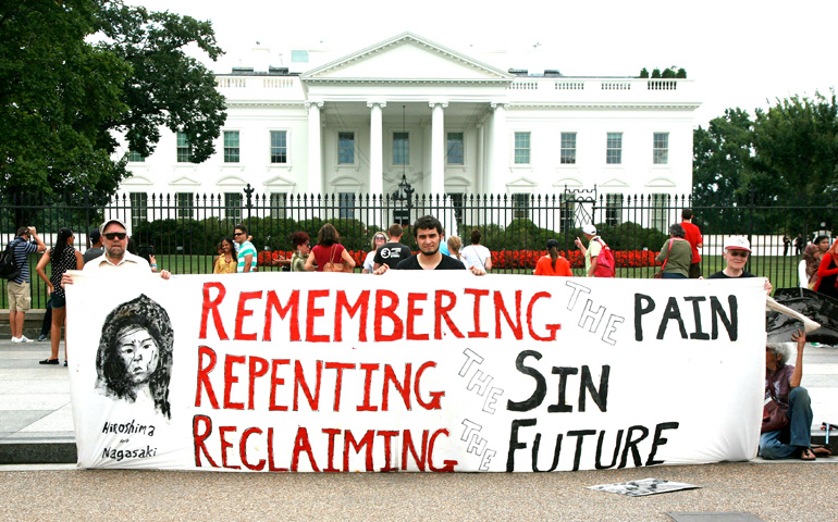 Peace activists gather Friday in front of the White House to observe the 68th anniversary of the U.S. bombing of Nagasaki, Japan. (Ted Majdosz)