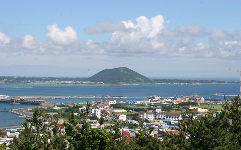 A view of Mt. Hallasan from atop Seongsan Ilchulbong crater, Jeju Island, Korea. (Megan Fincher)