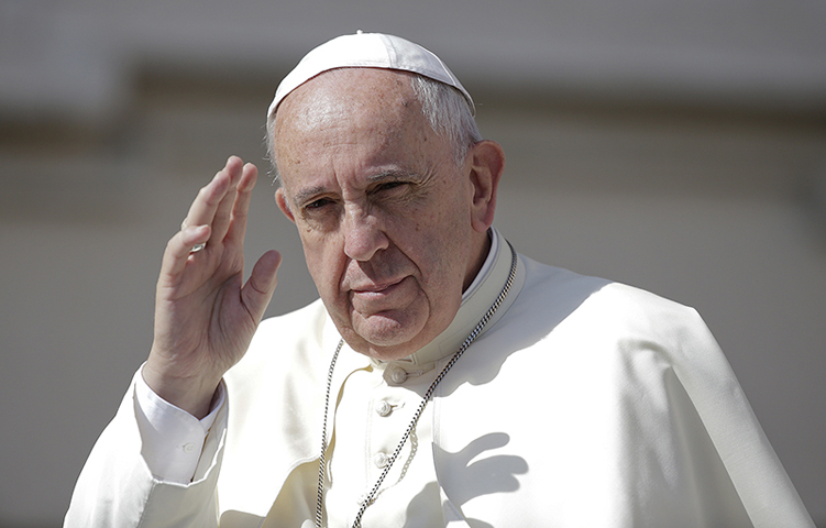 Pope Francis waves as he arrives to lead his Wednesday general audience in St. Peter’s Square at the Vatican on June 17, 2015. (Reuters/Max Rossi)