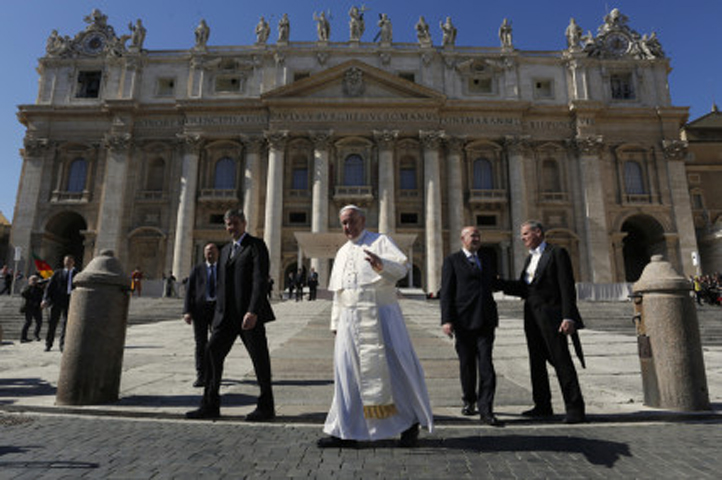 Pope Francis waves as he leaves after leading his weekly general audience in St. Peter’s Square at the Vatican on March 2, 2016. (Reuters/Alessandro Bianchi)