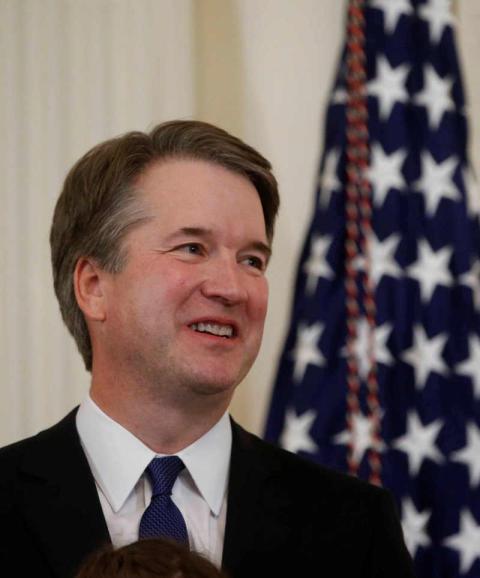 Brett Kavanaugh, a Catholic, who is a judge on the U.S. Court of Appeals for the District of Columbia Circuit, smiles July 9 at the White House in Washington after President Donald Trump named him his Supreme Court nominee. (CNS photo/Leah Millis, Reuters