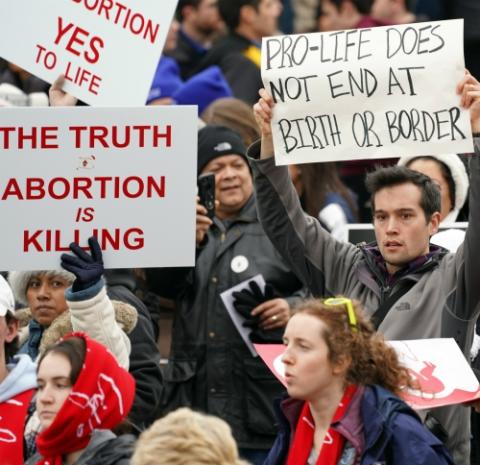 Pro-life advocates walk up Constitution Avenue en route to the U.S. Supreme Court during the 47th annual March for Life in Washington Jan. 24. (CNS/Long Island Catholic/Gregory A. Shemitz)