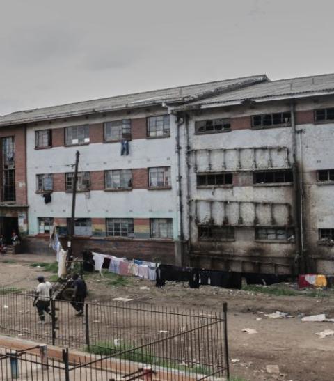 Block 13 of Matapi Flats is one of many old, dilapidated and poorly maintained hostels where cholera cases have been reported.