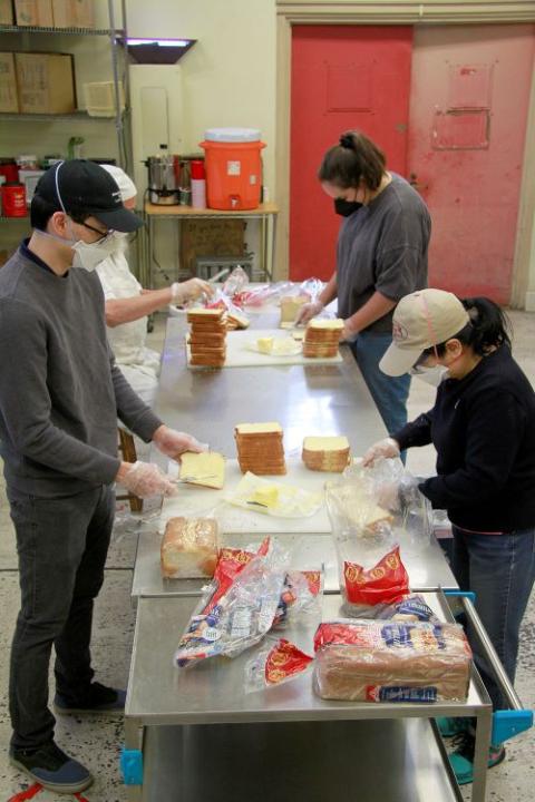 Community members work in the soup kitchen of the Los Angeles Catholic Worker in 1977. (NCR photo/Patty Edmonds)