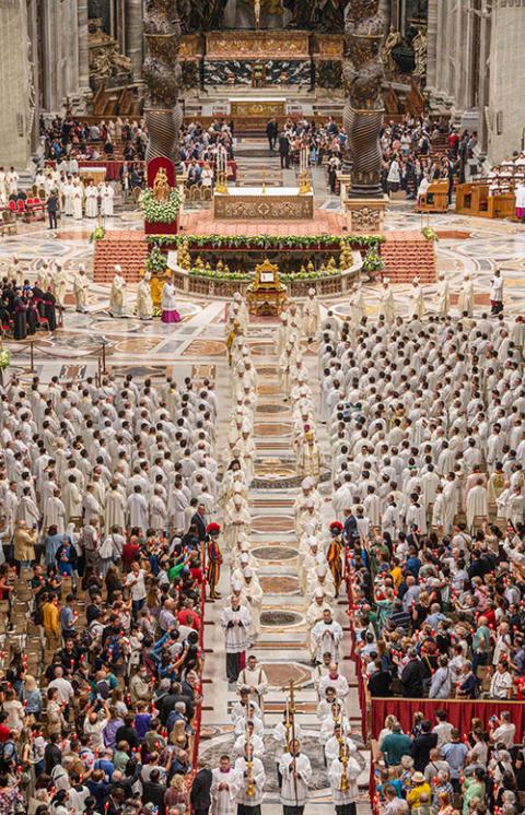 Cardinals and bishops process out of St. Peter's Basilica after Pope Francis celebrated Mass Oct. 11, 2022, to mark the 60th anniversary of the opening of the Second Vatican Council. (CNS/Vatican Media)