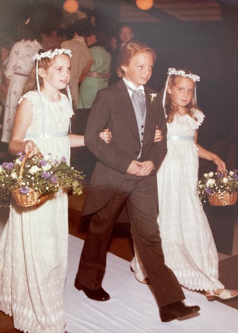 The author's younger siblings walk the aisle in the author's wedding on Sept. 13, 1980, in Malibu, California. (Courtesy of Valerie Schultz)