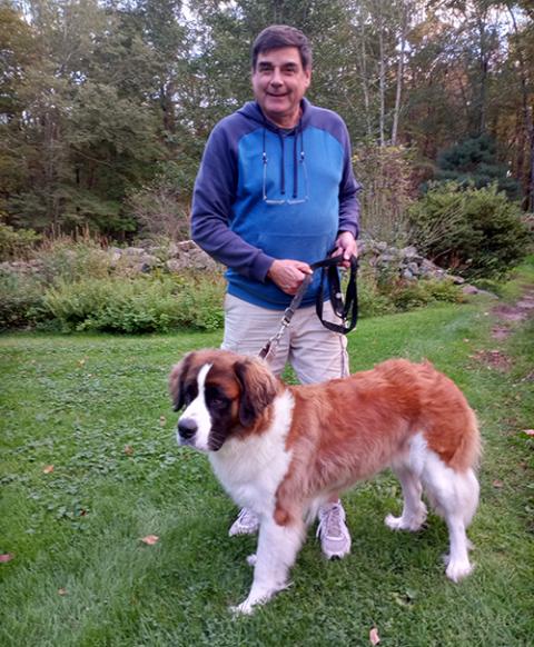 NCR columnist Michael Sean Winters is pictured with his St. Bernard, Damiana. (Courtesy of Michael Sean Winters)