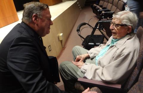 Fr. Ed Ruetz, a retired priest of the Diocese of Fort Wayne-South Bend, Indiana, speaks with Cardinal Joseph Tobin prior to an address by Tobin at the University of Notre Dame in 2018. (Don Clemmer)