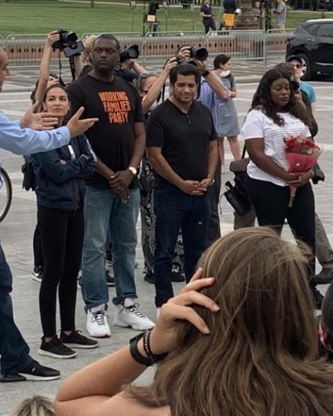 Congressional members stand in front of the Capitol Aug. 3 in Washington as news about the eviction moratorium is announced. (NCR photo/Melissa Cedillo)