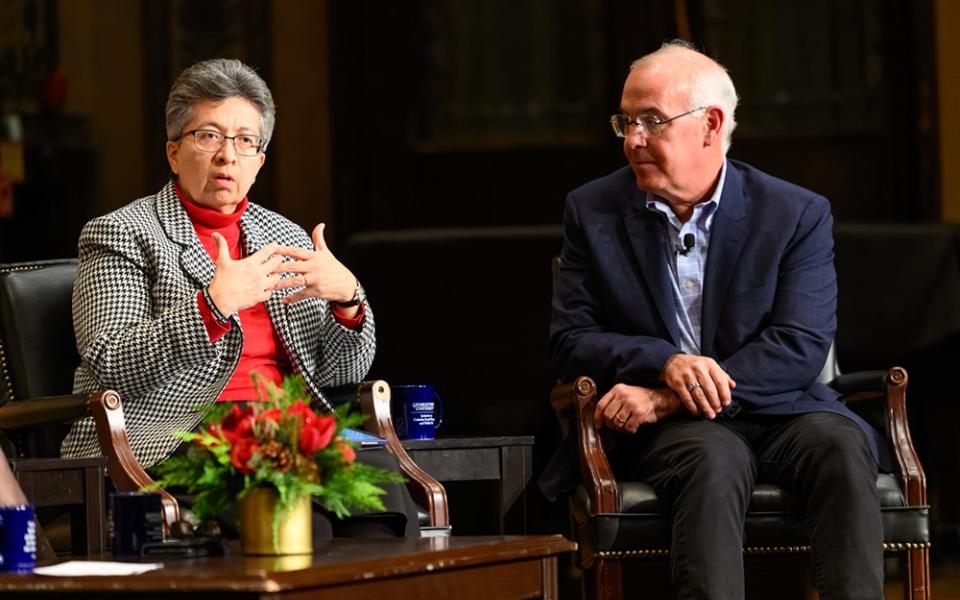 The New York Times columnist and Sr. Teresa Maya of the Congregation of the Sisters of Charity of the Incarnate Word in San Antonio, during the Dec. 10 public dialogue hosted by the Initiative on Catholic Social Thought and Public Life at Georgetown University in Washington, D.C. (Courtesy of Georgetown University/Rafael Suanes)