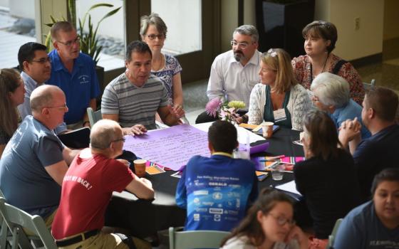 Organizers discuss Dominican University's "¡El Futuro is Here!: Cuentos y Recuerdos for the Journey." (Courtesy of Dominican University)