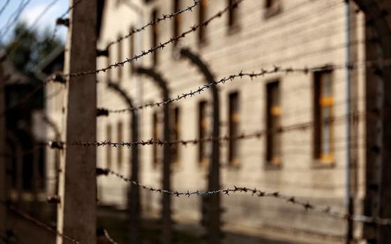 Lines of barbed-wire fencing enclose the Auschwitz-Birkenau Nazi death camp in Oświęcim, Poland, in this Sept. 4, 2015, file photo. (CNS/Nancy Wiechec)