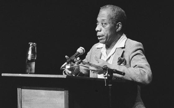 The influential novelist and essayist James Baldwin (1924-1987) speaks in Amsterdam in 1984. Giovanni's Room was published in 1956. (Wikimedia Commons/Fotocollectie Anefo Reportage)