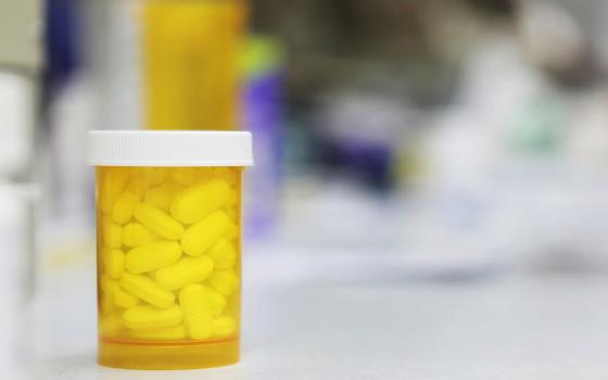 A bottle of prescription medication sits on a counter at a pharmacy in New York in this 2009 file photo. (CNS/Reuters/Lucas Jackson)