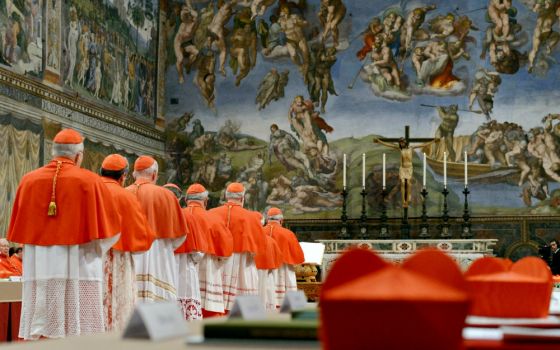 Cardinals from around the world are seen in the Vatican's Sistine Chapel March 12, 2013, as they begin the conclave to elect a successor to Pope Benedict XVI. (CNS/L'Osservatore Romano via Reuters)