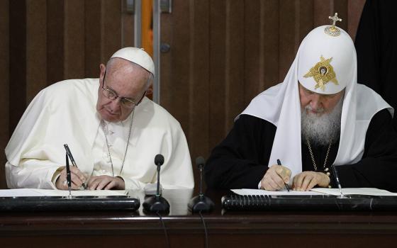 Pope Francis and Russian Orthodox Patriarch Kirill of Moscow sign a joint declaration during a meeting at Jose Marti International Airport Feb. 12, 2016, in Havana. (CNS/Paul Haring)