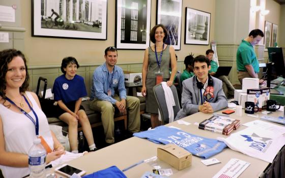 Executive director Kristen Day of the Democrats for Life of America, center, stands with other members of the pro-life organization during an event the group held in Philadelphia in July 2016.