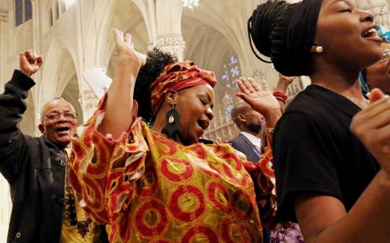 Members of the Mixed African Choir of St. Augustine-Our Lady of Victory Parish in the Bronx, New York, sing during the annual Black History Month Mass at St. Patrick's Cathedral in New York Feb. 5. (CNS/Gregory A. Shemitz)