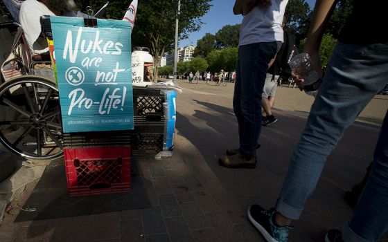 A nuclear war protester demonstrates outside the White House in Washington in 2017. (CNS/Tyler Orsburn)